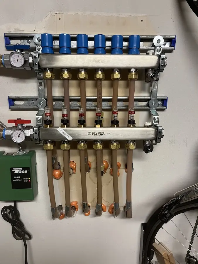 Plumber performing Water Heater Repair at a residential property in Edwardsville